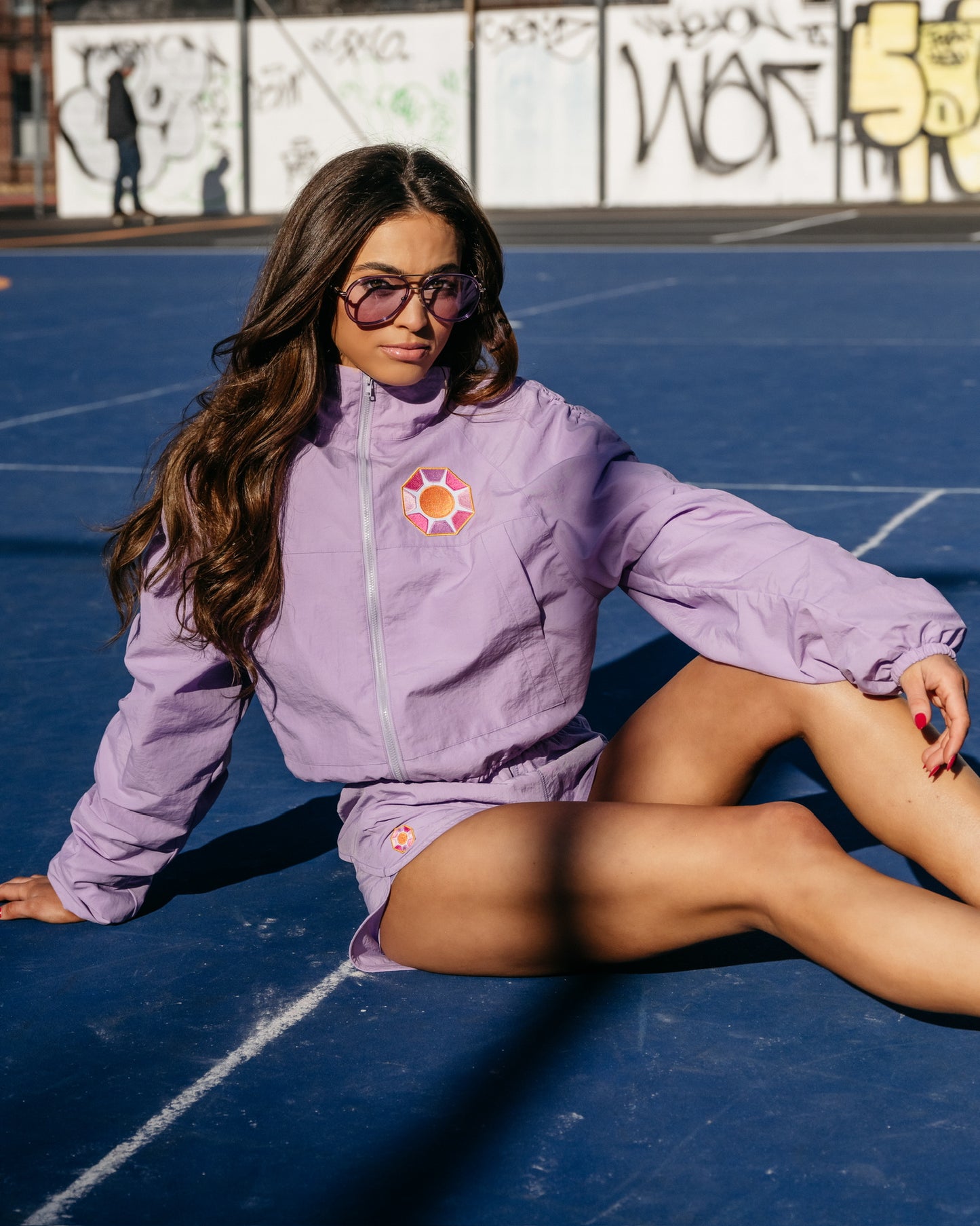 Grace Ann Nader in Solitaire Sun Track Jacket, Purple