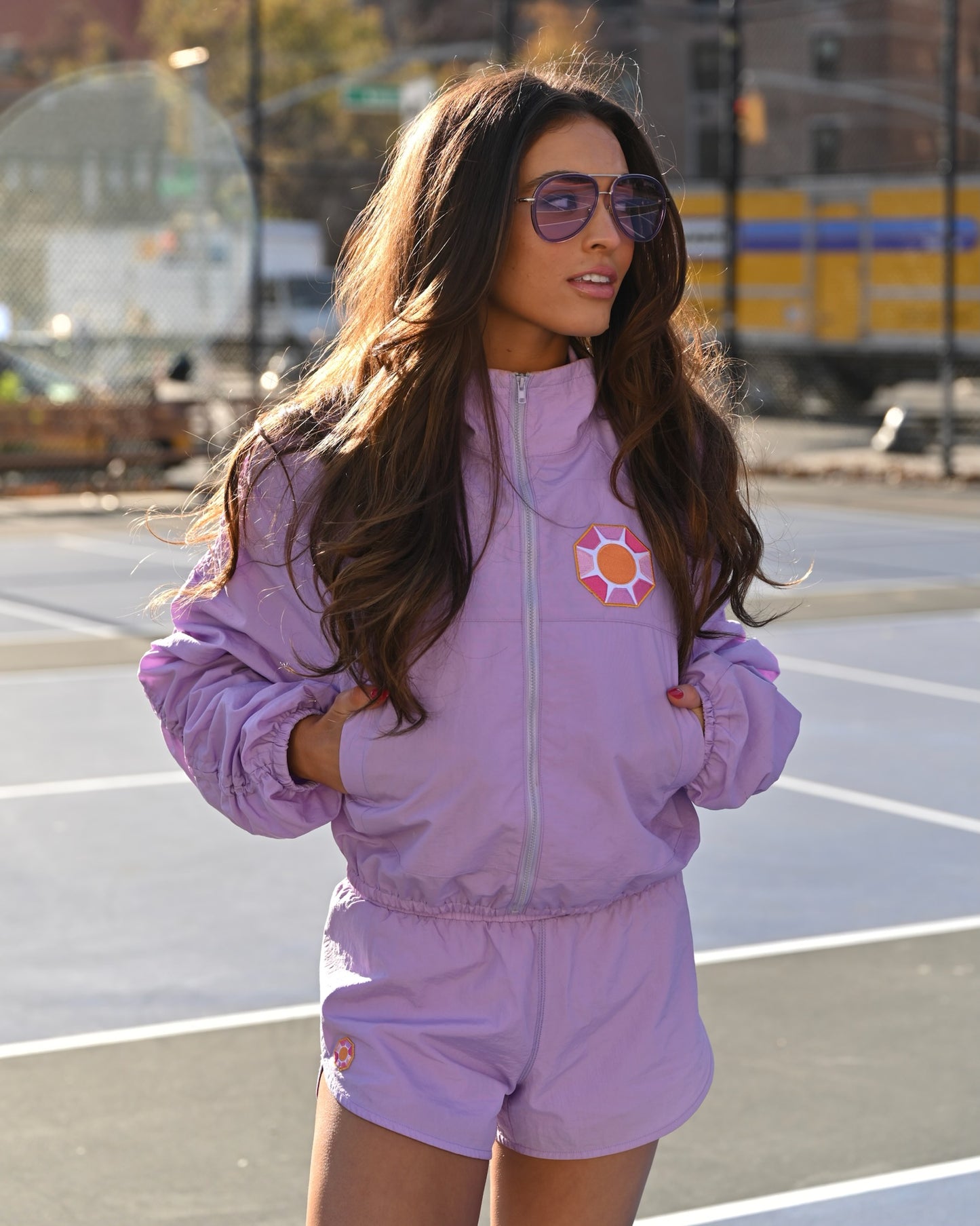 Grace Ann Nader in Solitaire Sun Track Shorts, Purple