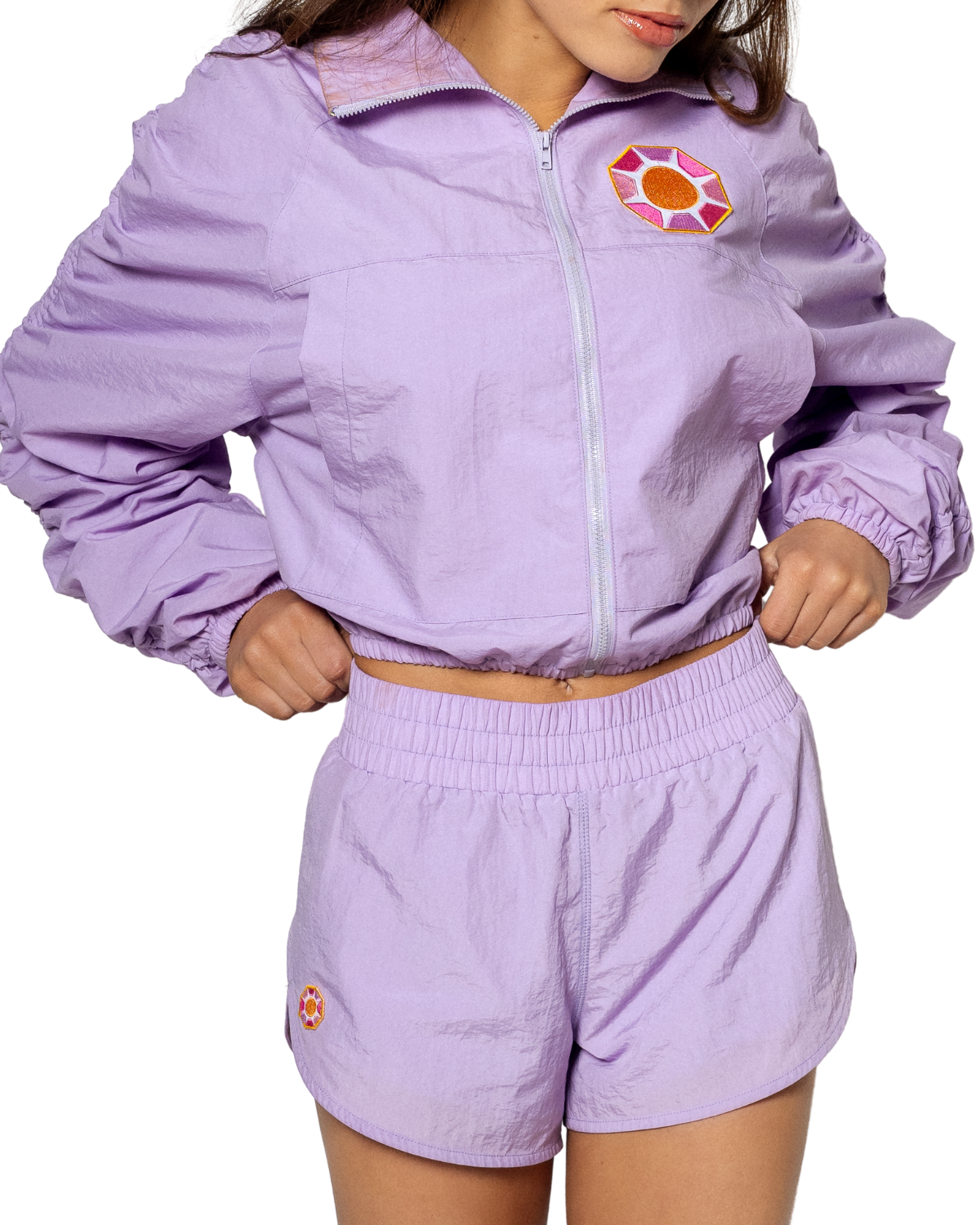 Grace Ann Nader in Solitaire Sun Track Shorts, Purple