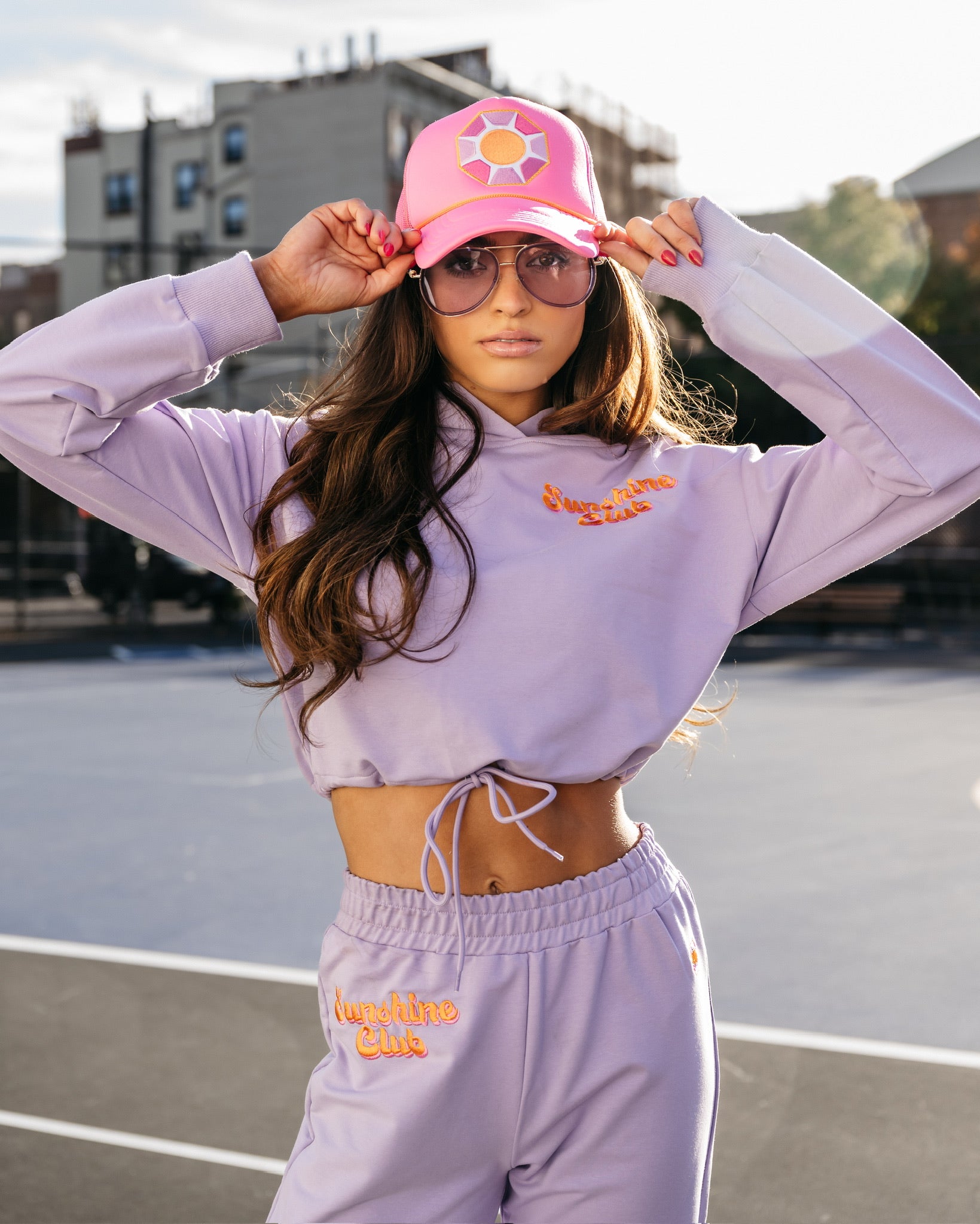 Grace Ann Nader in Solitaire Sun Trucker Hat, Pink