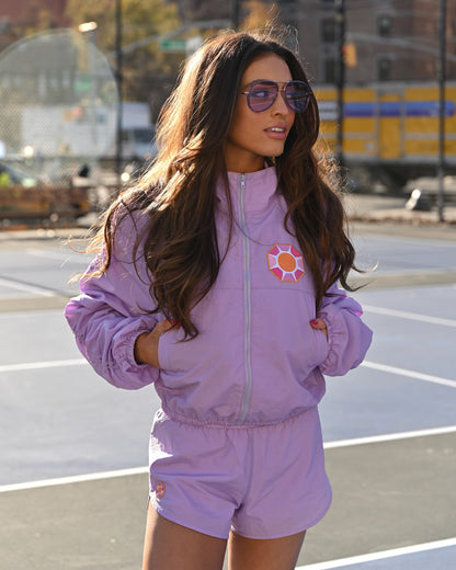 Grace Ann Nader in Solitaire Sun Track Shorts, Purple