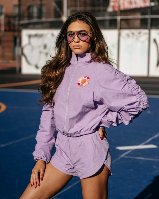 Grace Ann Nader in Solitaire Sun Track Shorts, Purple